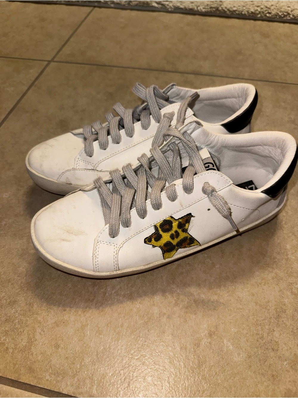 White Sneakers with Leopard Star Accent